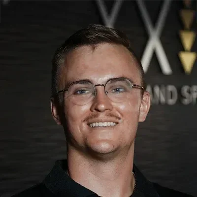 A headshot photo of chiropractor Collin Jensen